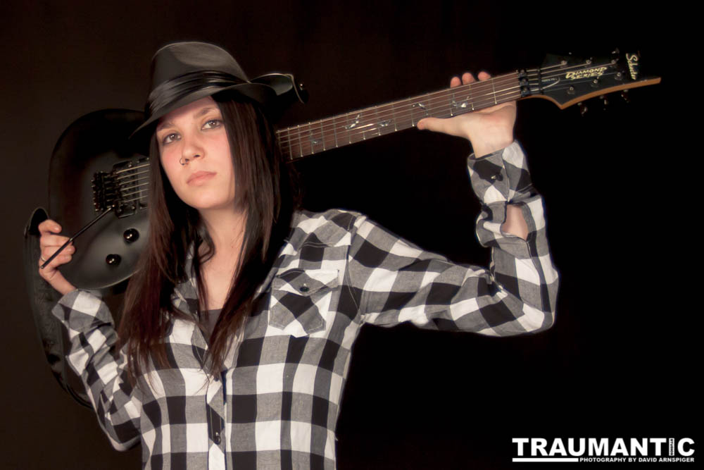 I saw an amazing picture on a web site of this female guitarist.  She was beautiful.  After a bit of searching, I was able to contact her and we did this shoot together.